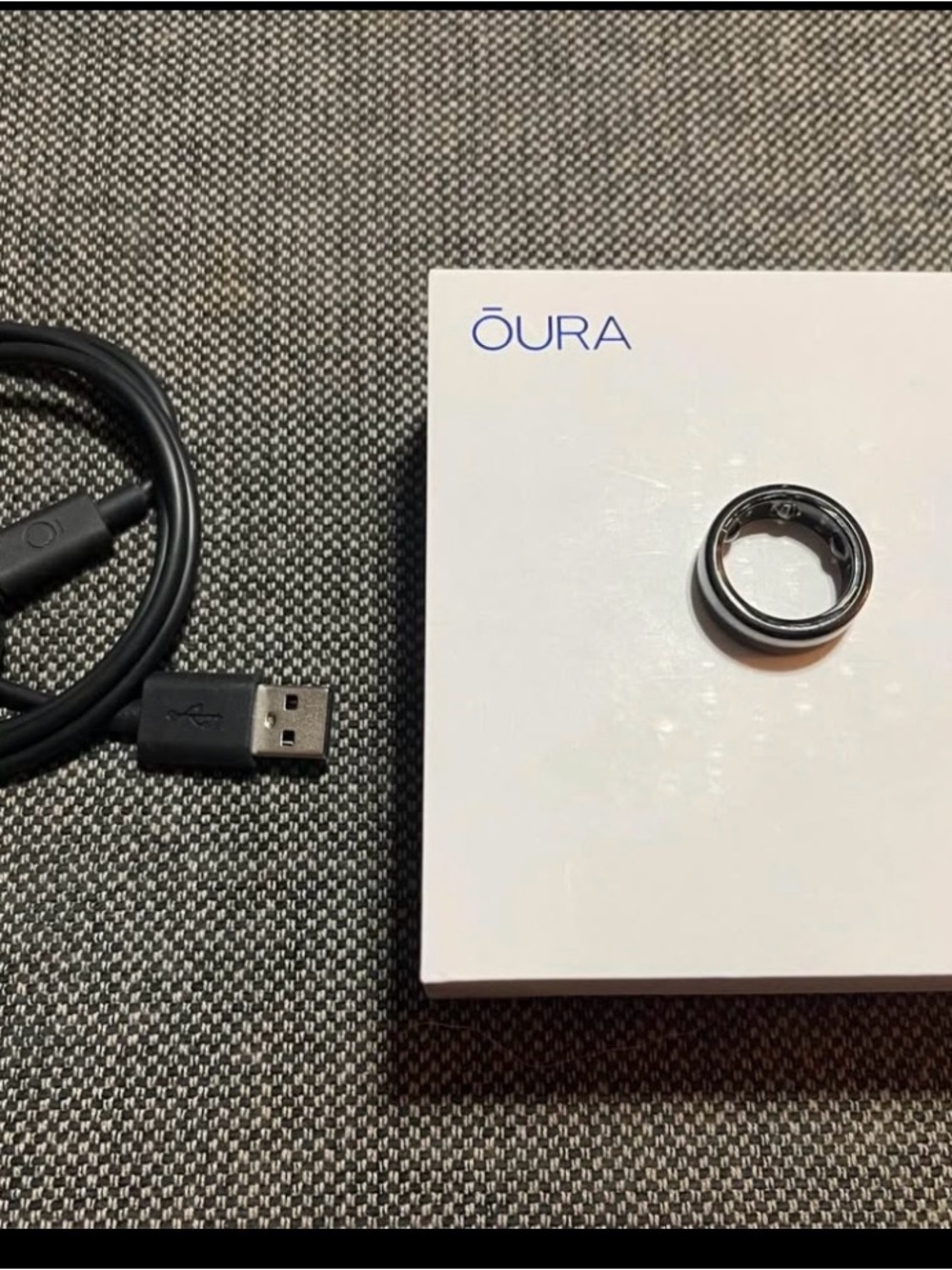 Oura Smart Ring in Black and Silver with USB Charging Cable